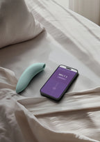 WE-VIBE | Melt 2 – Estimulador de clítoris para parejas con Pleasure Air y control por app – Púrpura / Verde