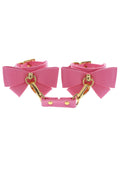 TABOOM | Malibu Wrist Cuffs – Esposas de Cuero Vegano Rosa con Lazo